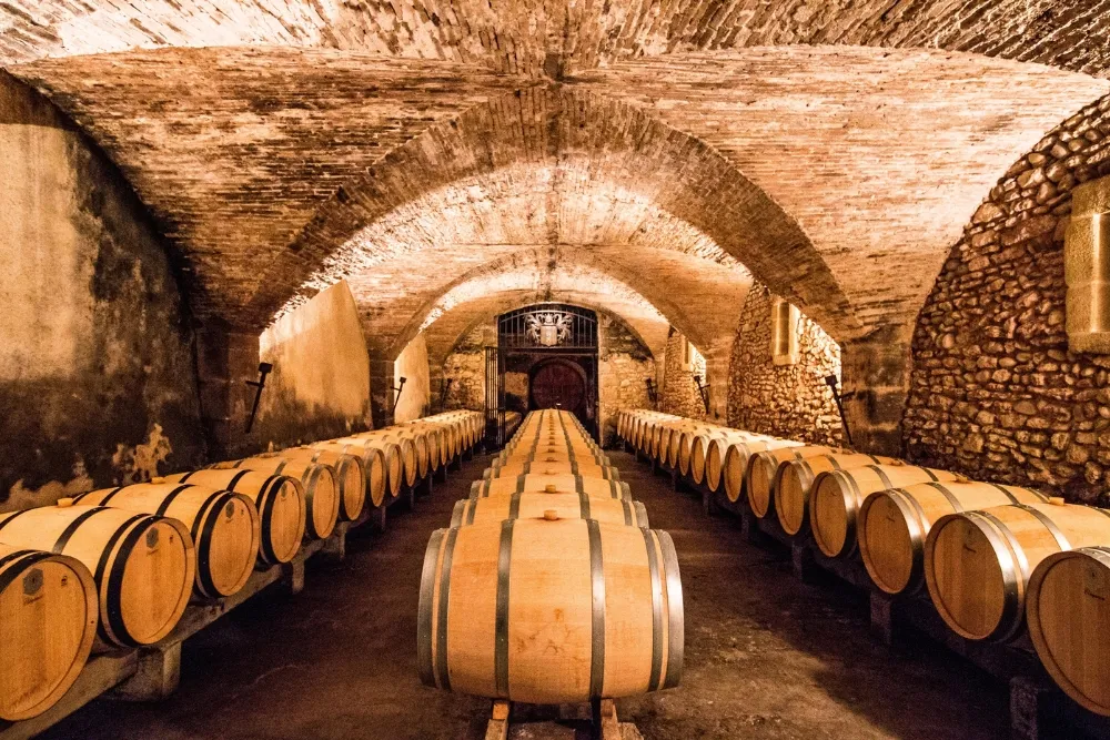Rows of barrels in a basement